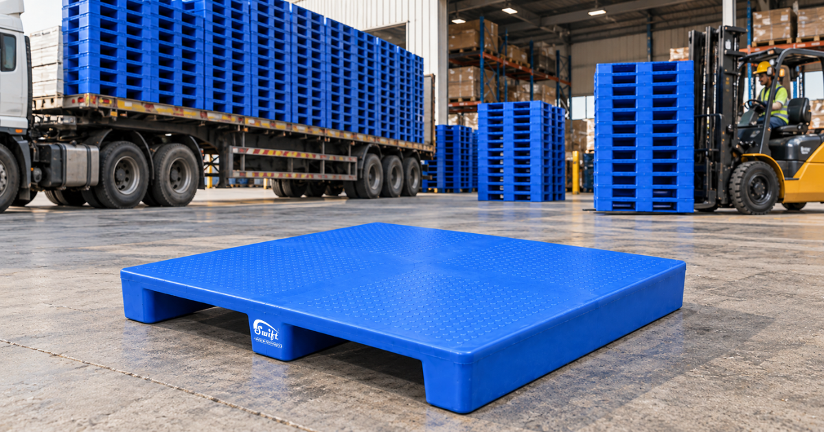 2 Way Entry Non Reversible Plastic Pallets stacked in bulk on a cargo truck